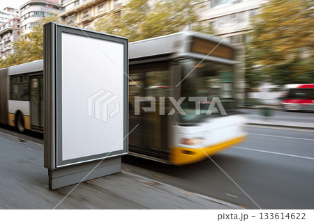 Empty ad space on a moving bus with motion blurred city background. 133614622