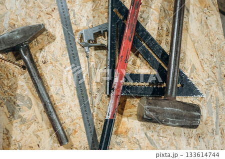 Construction tools on the wooden table, close up view 133614744