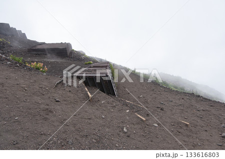 On Mount Fuji, Kitayama, Fujinomiya, Shizuoka, Japan, Wooden staircase descending a foggy volcanic ash slope in outdoor nature 133616803