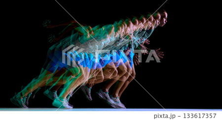 Multi-exposure view of athlete accelerating from sprint start 133617357