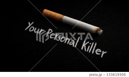 Message about the dangers of smoking with a cigarette placed on a black background highlighting serious health risks 133619308