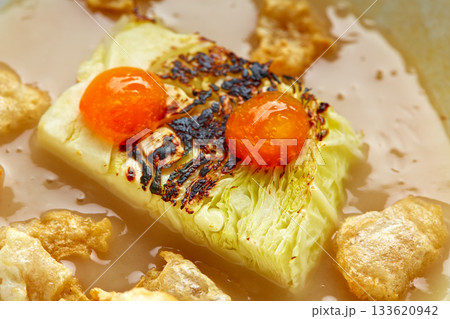 Cabbage stew with pork rinds 133620942