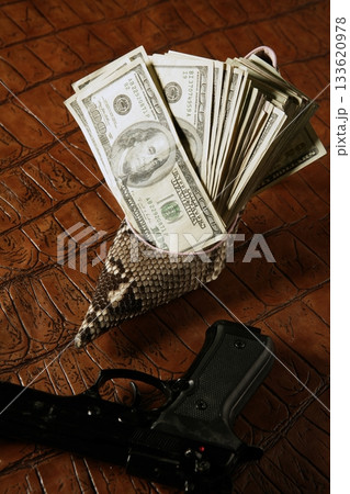 Dollar notes and gun, black pistol Dollar notes and gun, black pistol 133620978