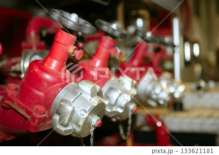 fire truck hose faucets in a row fire truck hose faucets in a row 133621181