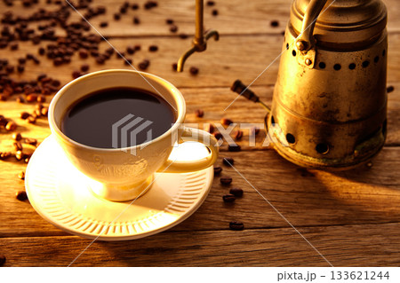 Coffee with vintage machine on aged wood 133621244
