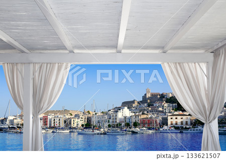 Ibiza town view from white gazebo 133621507