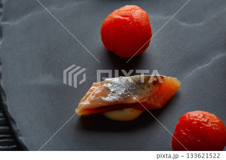 Bota sardine with osmotized tomatoes macro 133621522