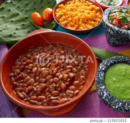 Frijoles mexican beans with rice and sauces 133621832