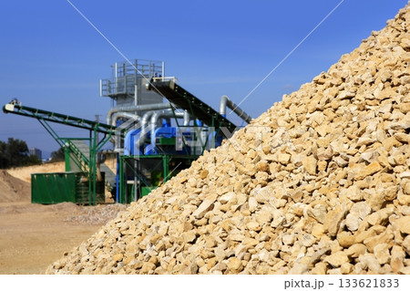 crushed pound stone mound quarry open blue sky 133621833
