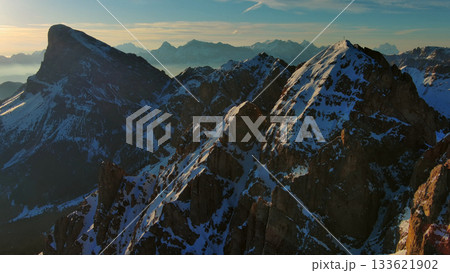 Rocky snow mountains at sunrise aerial Rocky snow mountains at sunrise aerial 133621902