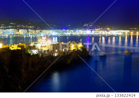 Ibiza town port blue sea night lights 133622414