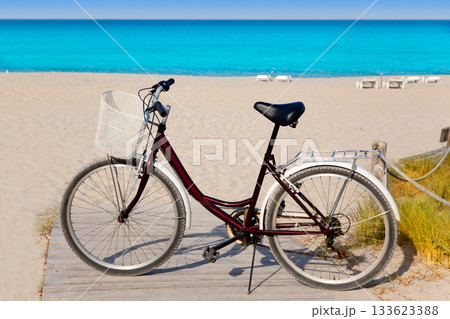 Bicycle in formentera beach on Balearic islands Bicycle in formentera beach on Balearic islands 133623388