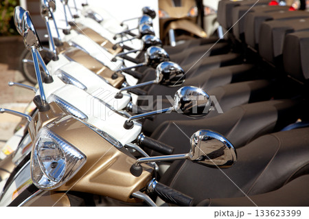 bikes scooter motoerbikes detail in a row 133623399