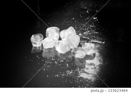 black and white ice cubes on iced water black and white ice cubes on iced water 133623464