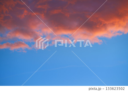 Sunset sky clouds orange and blue 133623502