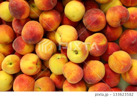 Peaches pattern texture fruit market background Peaches pattern texture fruit market background 133623582