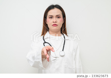 Handshake of Asian Healthcare Professional Doctor in White Coat Studio Portrait 133623673