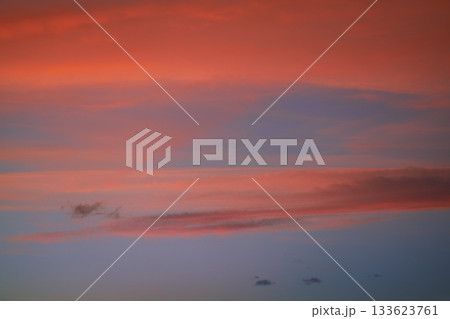 Sunset sky clouds orange and blue Sunset sky clouds orange and blue 133623761