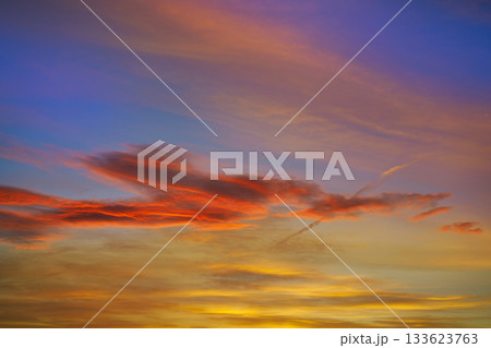 Sunset sky clouds orange and blue Sunset sky clouds orange and blue 133623763