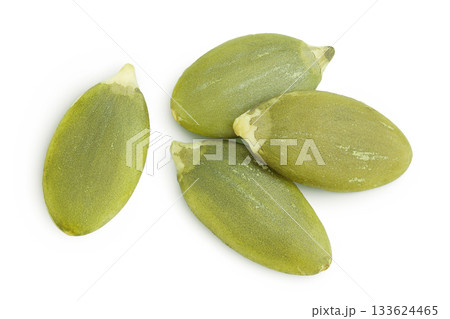 Peeled pumpkin seeds isolated on white background. Top view. Flat lay Peeled pumpkin seeds isolated on white background. Top view. Flat lay 133624465