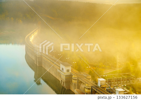Morning fog over dam on Embalse de Aguilar de Campoo, Spain. Morning fog over dam on Embalse de Aguilar de Campoo, Spain. 133627156