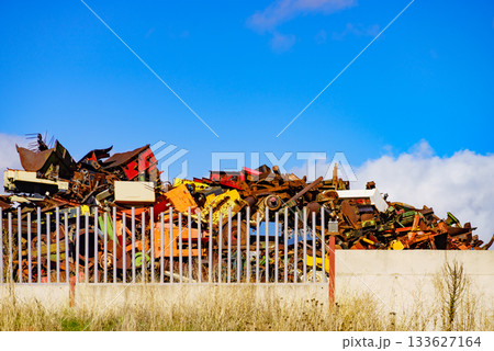 Scrap metal on recycling plant site. Scrap metal on recycling plant site. 133627164