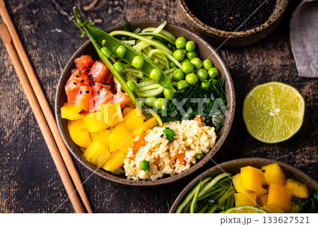 Healthy bowl with salmon and vegetables 133627521