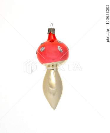 Vintage glass Christmas mushroom ornament with a red cap and metallic stem isolated on white. 133628003