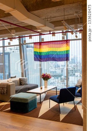 A room with a rainbow flag hanging from the ceiling A room with a rainbow flag hanging from the ceiling 133628475