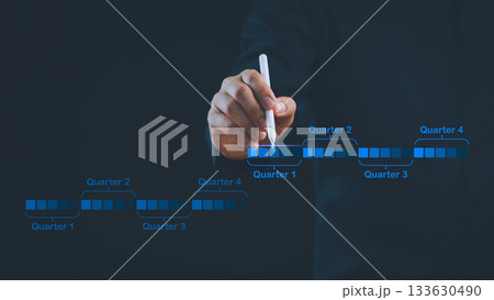Business hand planning quarterly timeline with digital chart, representing project management, strategy, scheduling, corporate goals, and financial planning for effective business growth. Business hand planning quarterly timeline with digital chart, representing project management, strategy, scheduling, corporate goals, and financial planning for effective business growth. 133630490