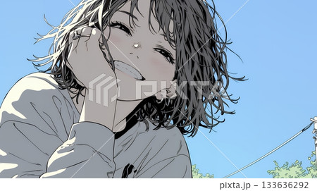 声をあげて大笑いする若い女性