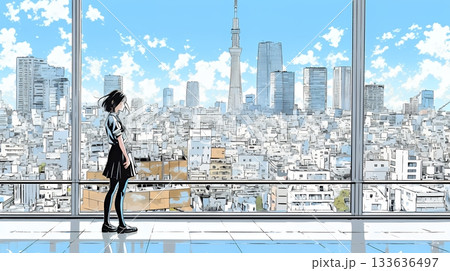 高層ビル群を見下ろすキャリア女性