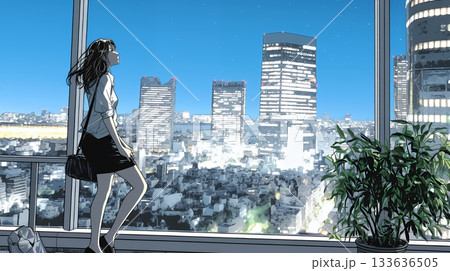 高層ビル群を見下ろすキャリア女性