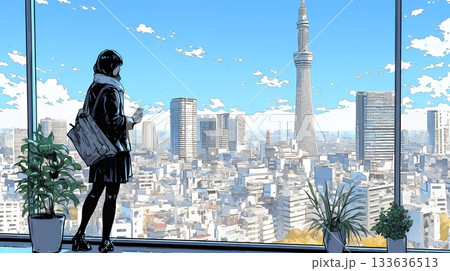 高層ビル群を見下ろすキャリア女性