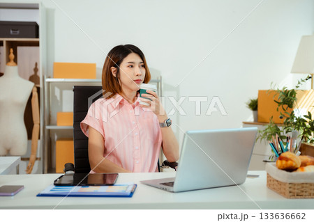 Successful Woman online seller. small business entrepreneur SME or Asian woman working freelance with online sell at home. 133636662