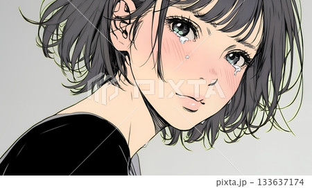 涙ぐむ若い女性