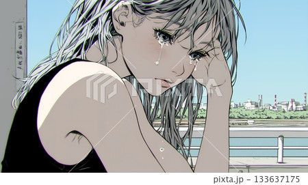 涙ぐむ若い女性