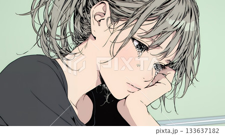 涙ぐむ若い女性