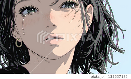 涙ぐむ若い女性