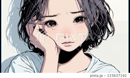 涙ぐむ若い女性