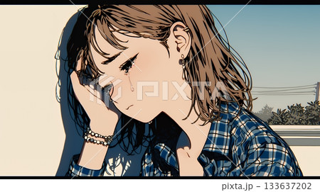 涙ぐむ若い女性