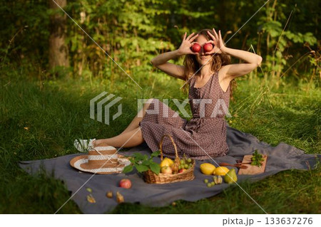 European young woman ponders life amid tranquil woodland setting European young woman ponders life amid tranquil woodland setting 133637276