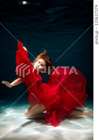 Peaceful aquatic scene with floating hair and soft glow Peaceful aquatic scene with floating hair and soft glow 133637374