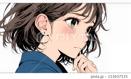 涙ぐむ制服姿の女子高生