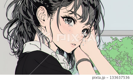 涙ぐむ制服姿の女子高生