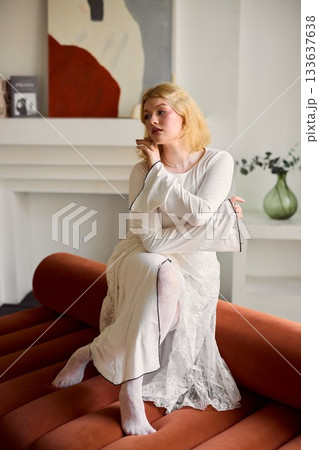 Serene scene featuring fashionable woman and cozy surroundings Serene scene featuring fashionable woman and cozy surroundings 133637638