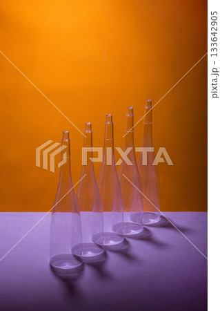Still life with figures of conical shape on a colored background Still life with figures of conical shape on a colored background 133642905