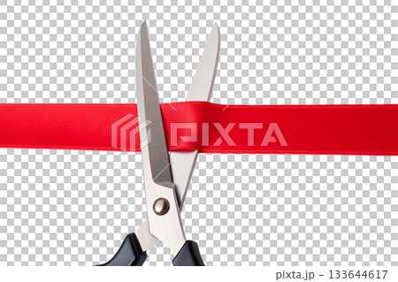 Ceremonial moment of scissors cutting a bold red ribbon for a grand opening, symbolizing new beginnings for a business, event 133644617