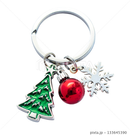Festive christmas keychain with tree, bauble, snowflake charms, isolated on transparent background for holiday design projects 133645390