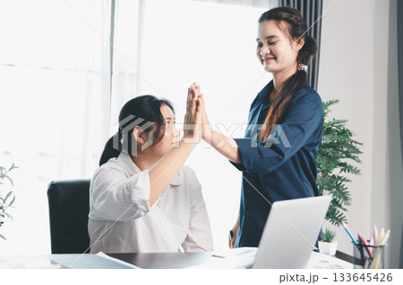 Business meeting, data analytics or women with graph presentation in office. Chart, analysis accounting team brainstorming economy, inflation or solution. business project finance investment concept. 133645426